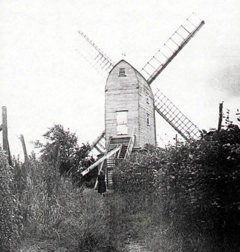 Historic black and white image of bocking windmill from behind