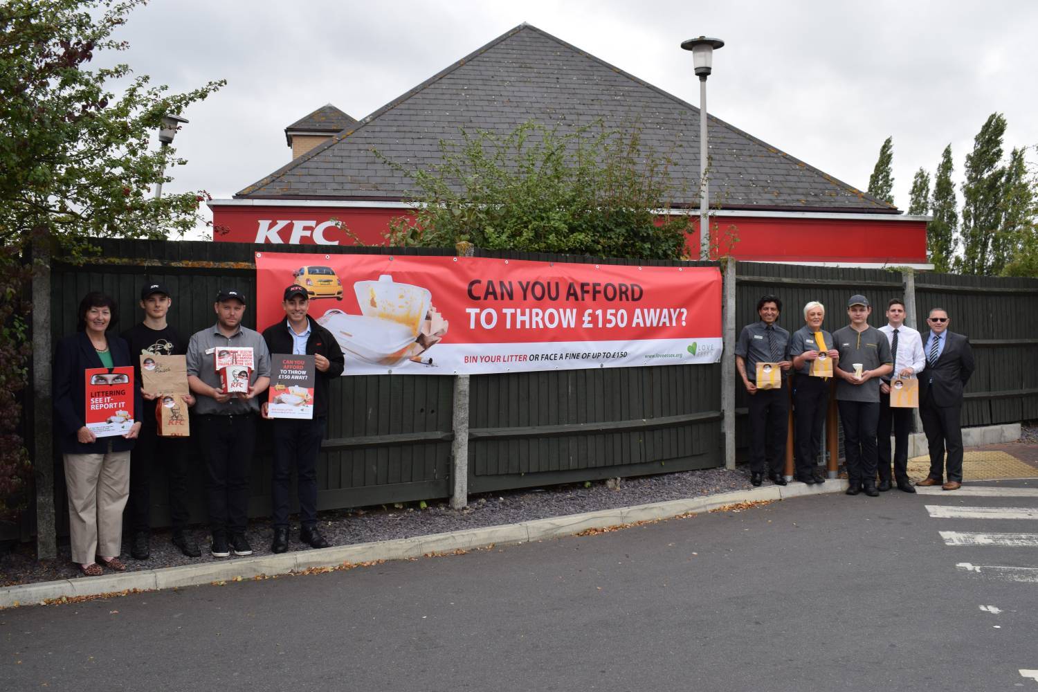 Cllr Wendy Schmitt with KFC and McDonald's staff at McDonald's, Braintree