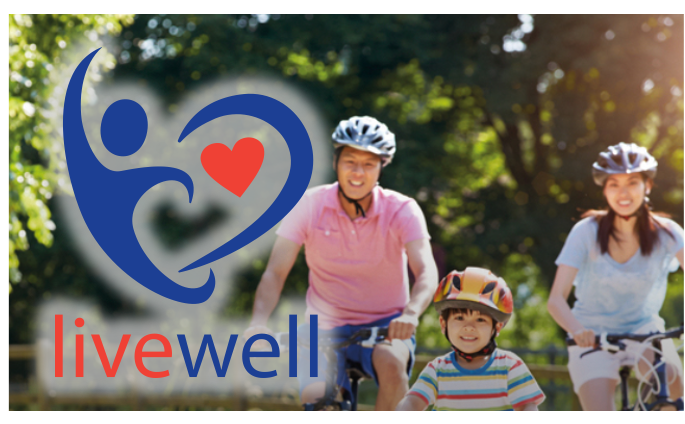 Livewell logo on image of a family on bikes on the forest