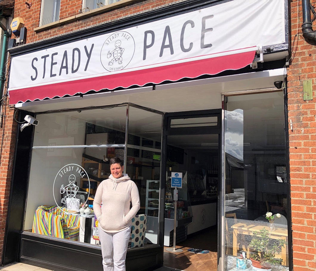 Lady standing at Steady Pace cafe and bakery in Halstead