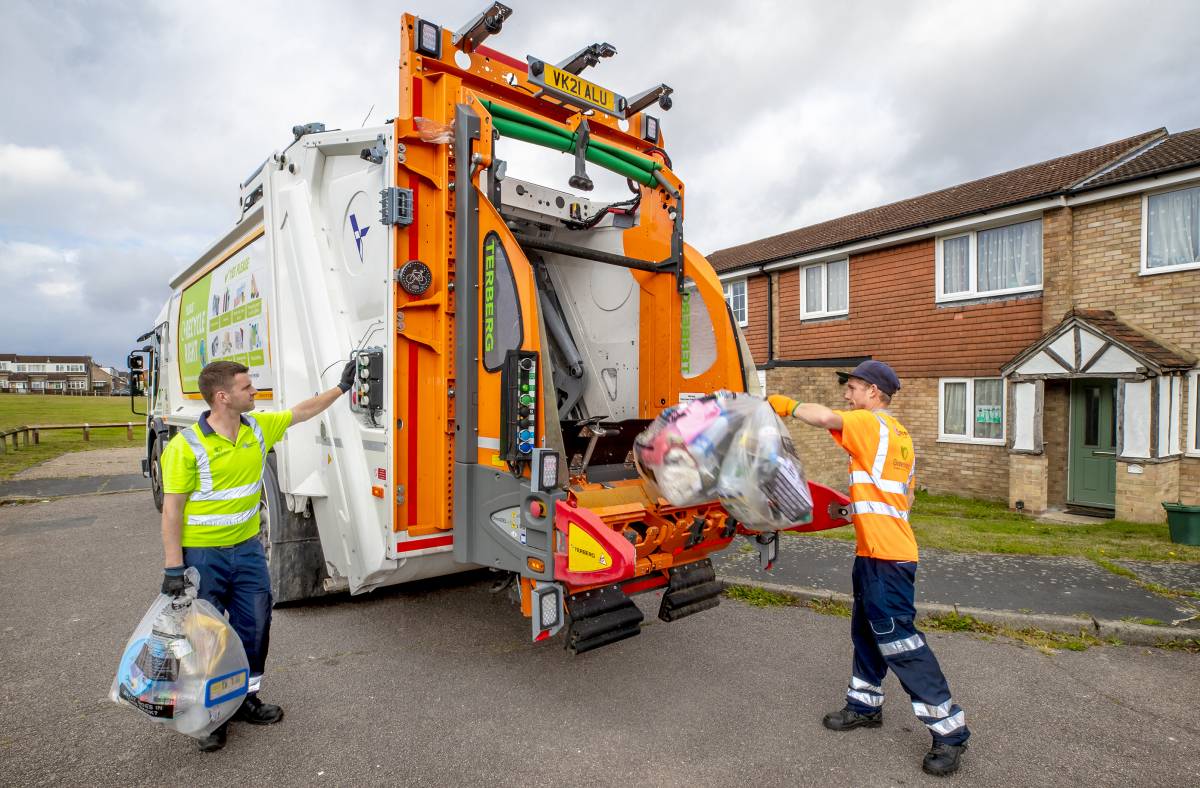 Braintree district council's collection crew loading clear recycling sacks into a collection vehicle
