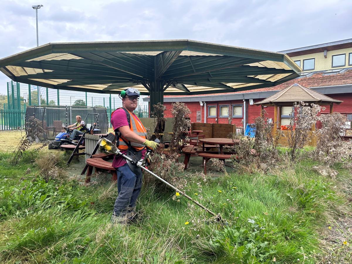 Braintree district council operatives tending to the overgrown grounds.