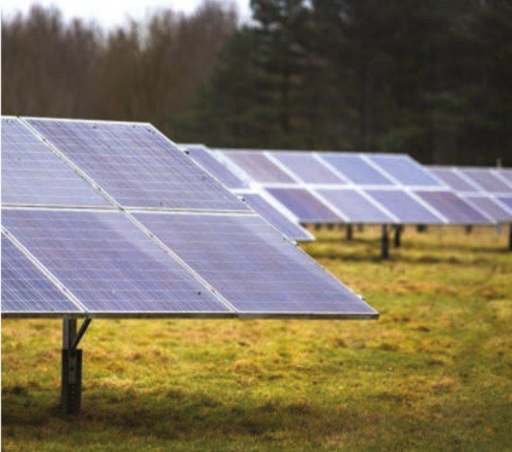 Photo of solar panels in a field