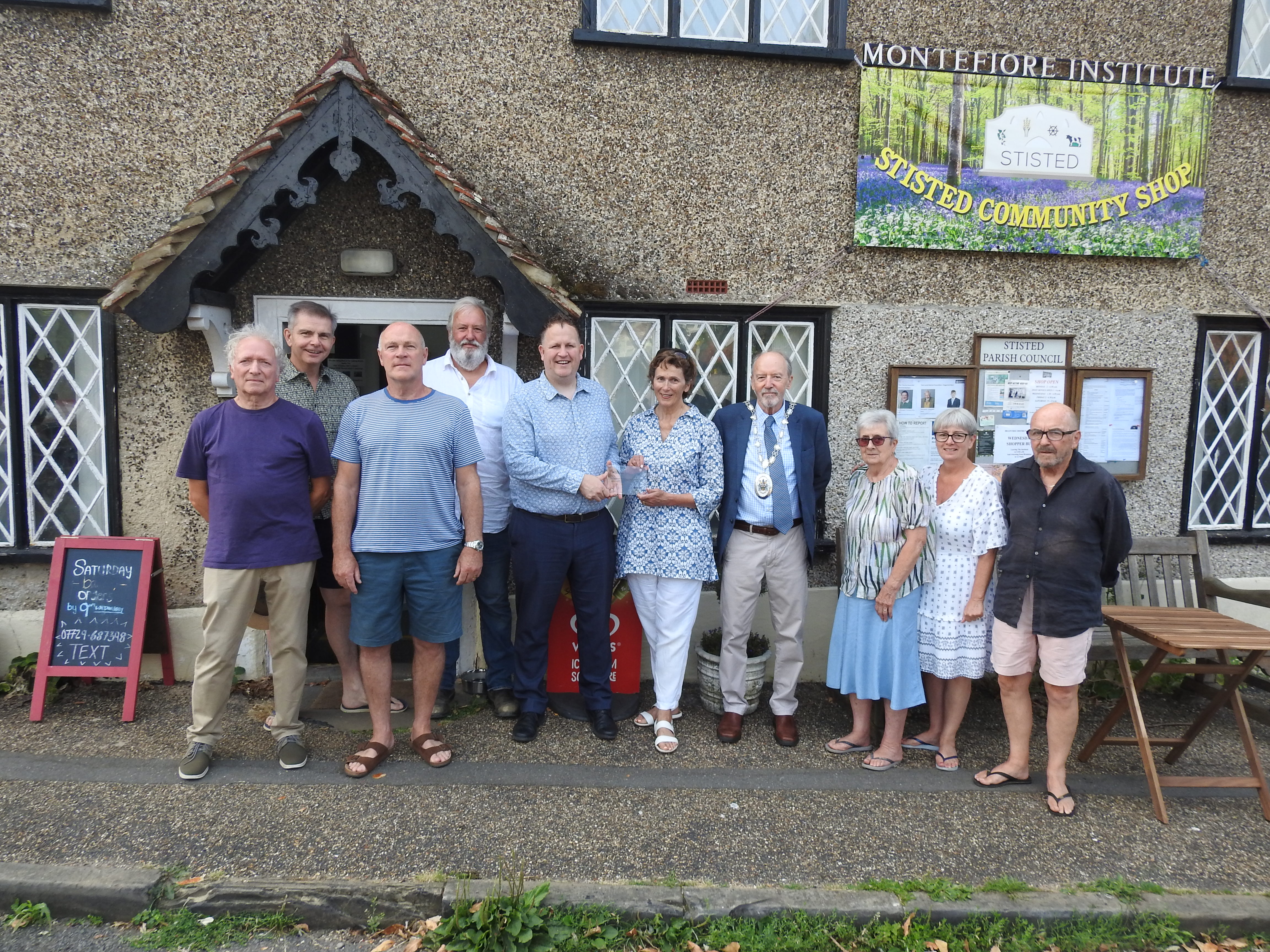 Cllr Justin Wrench (Cabinet Member for Economic Growth) and Cllr Richard van Dulken (Chairman of Braintree District Council) presenting a plaque to the trustees of the Montefiore Institute.