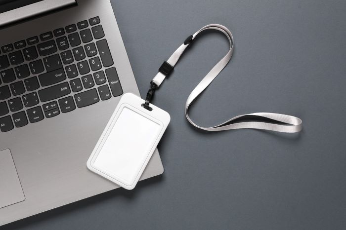 ID badge on top of a laptop