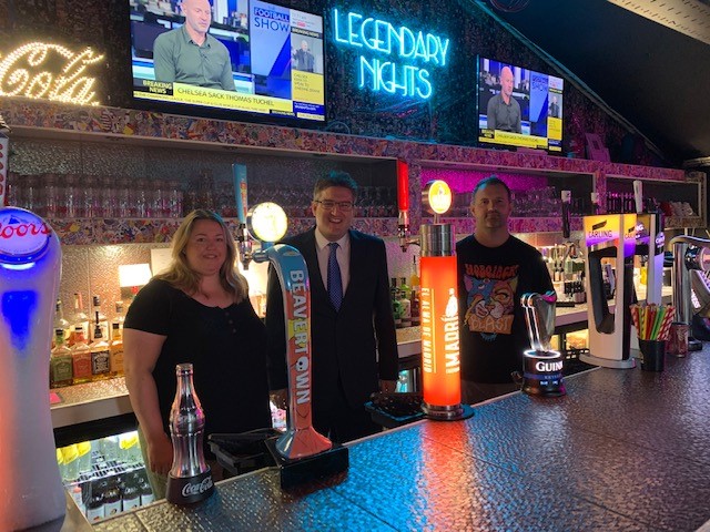 Three people stood behind bar at Legends in Braintree