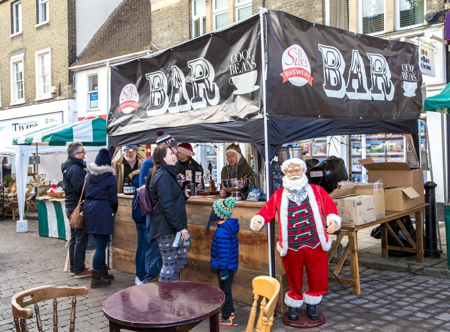 Market stall selling christmas themed acoholic drinks in Braintree
