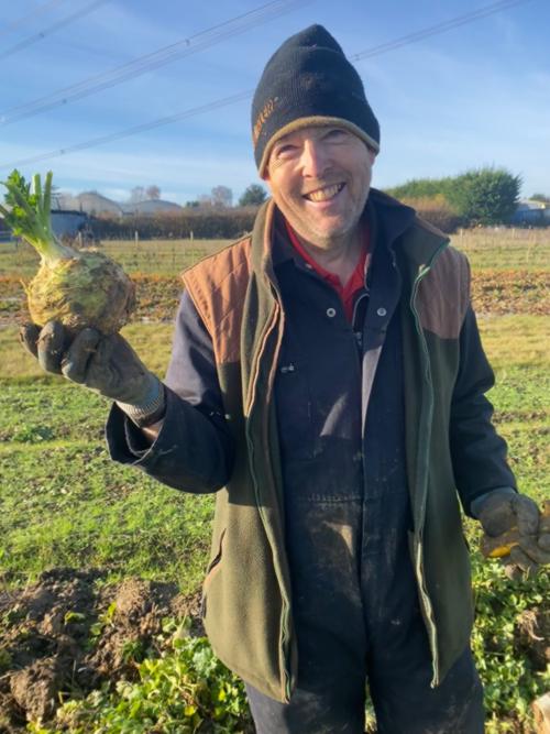Photo of Olivers Plants - man holding locally grown celeriac
