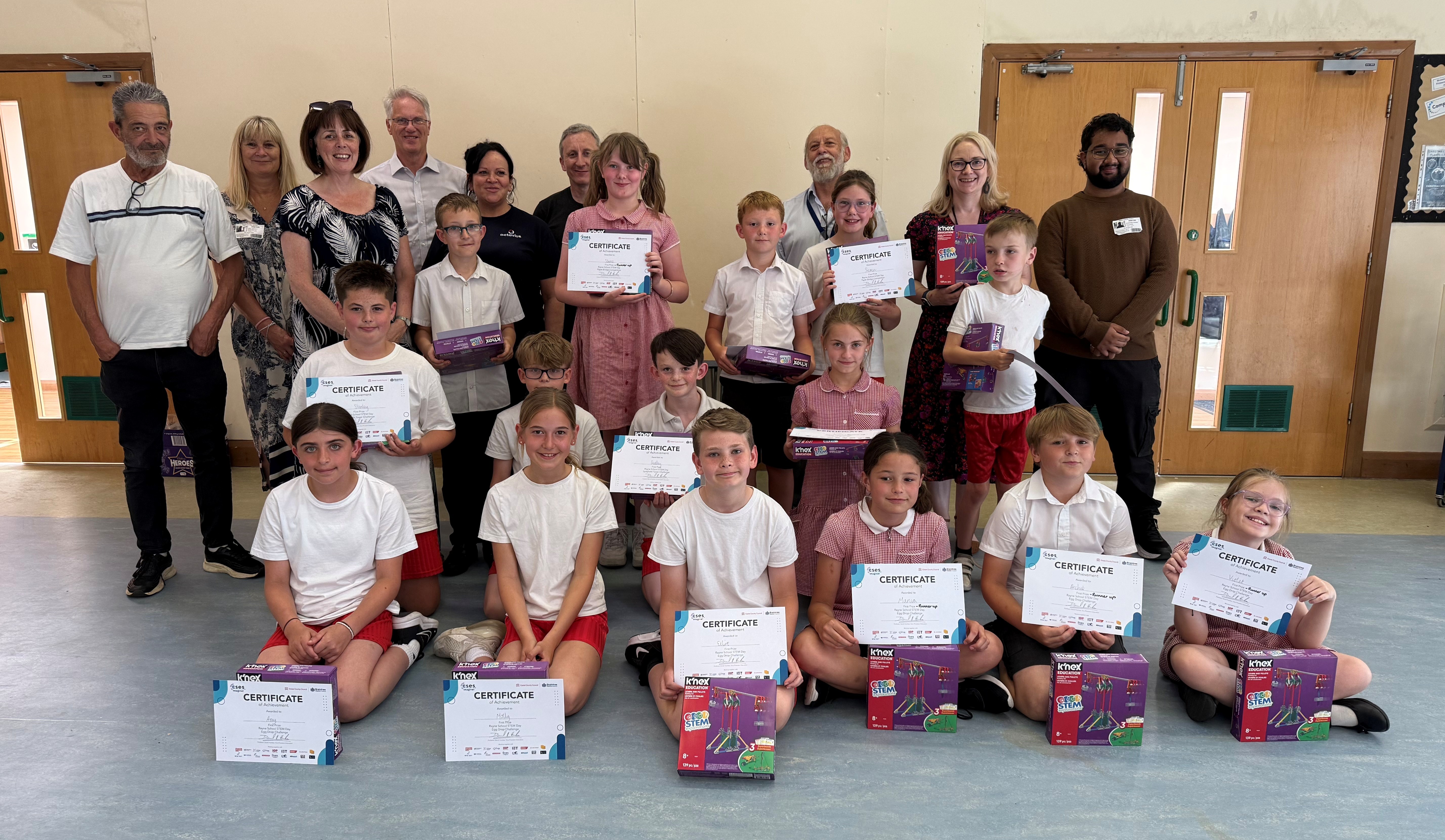 Winners and runners up at Rayne Primary School receiving their certificates and prizes together with STEM volunteers, senior teachers and a representative from Braintree District Council.