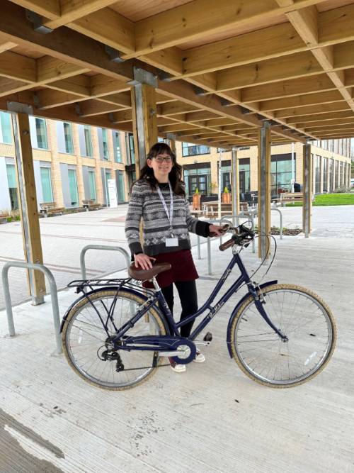 Photo of miriam with bicycle