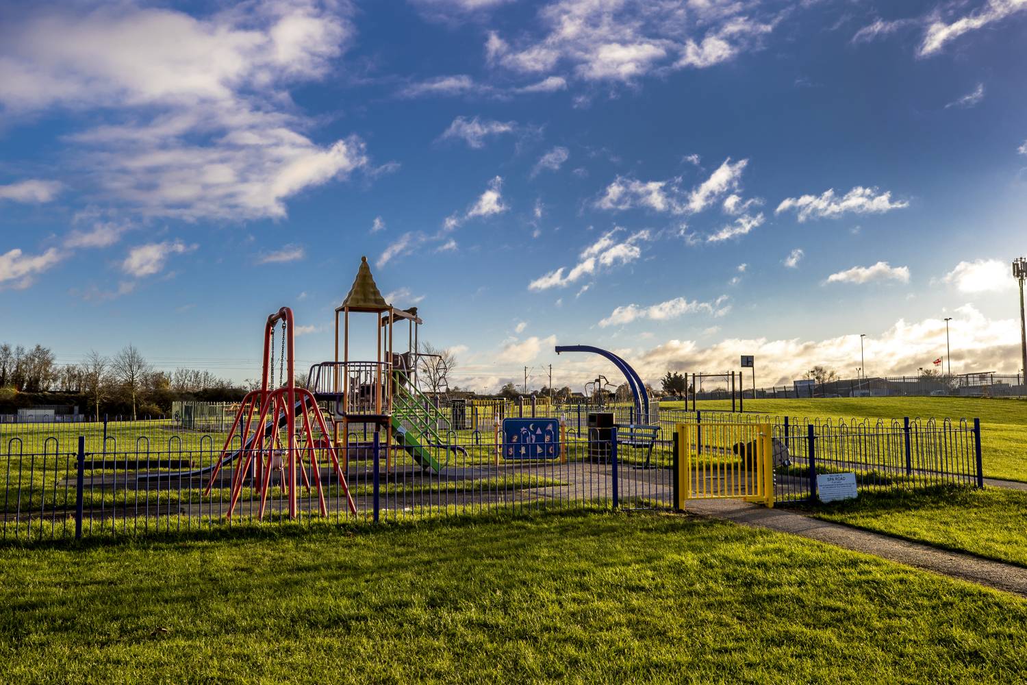 Spa road park witham play equipment on field - Image