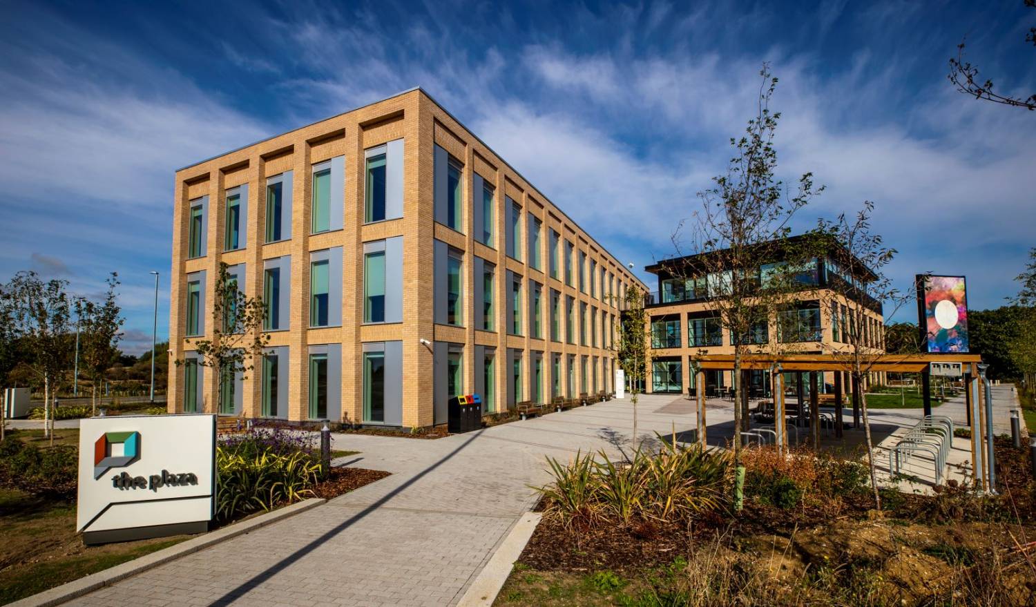 A wide shot of the plaza centre building 