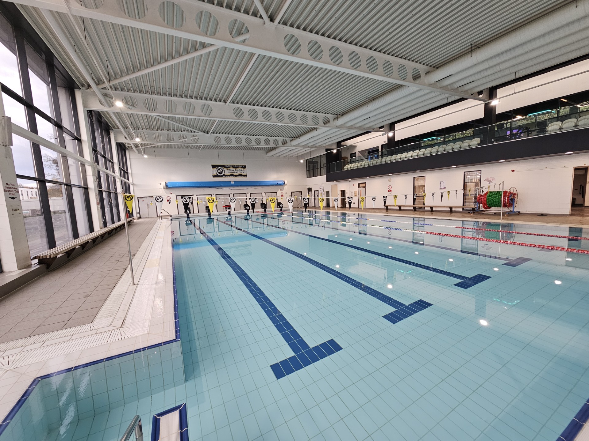 The image shows a picture of a swimming pool