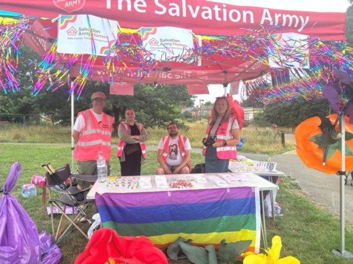 Braintree pride stall represented by volunteers, with marquee and banner branded by the salvation army