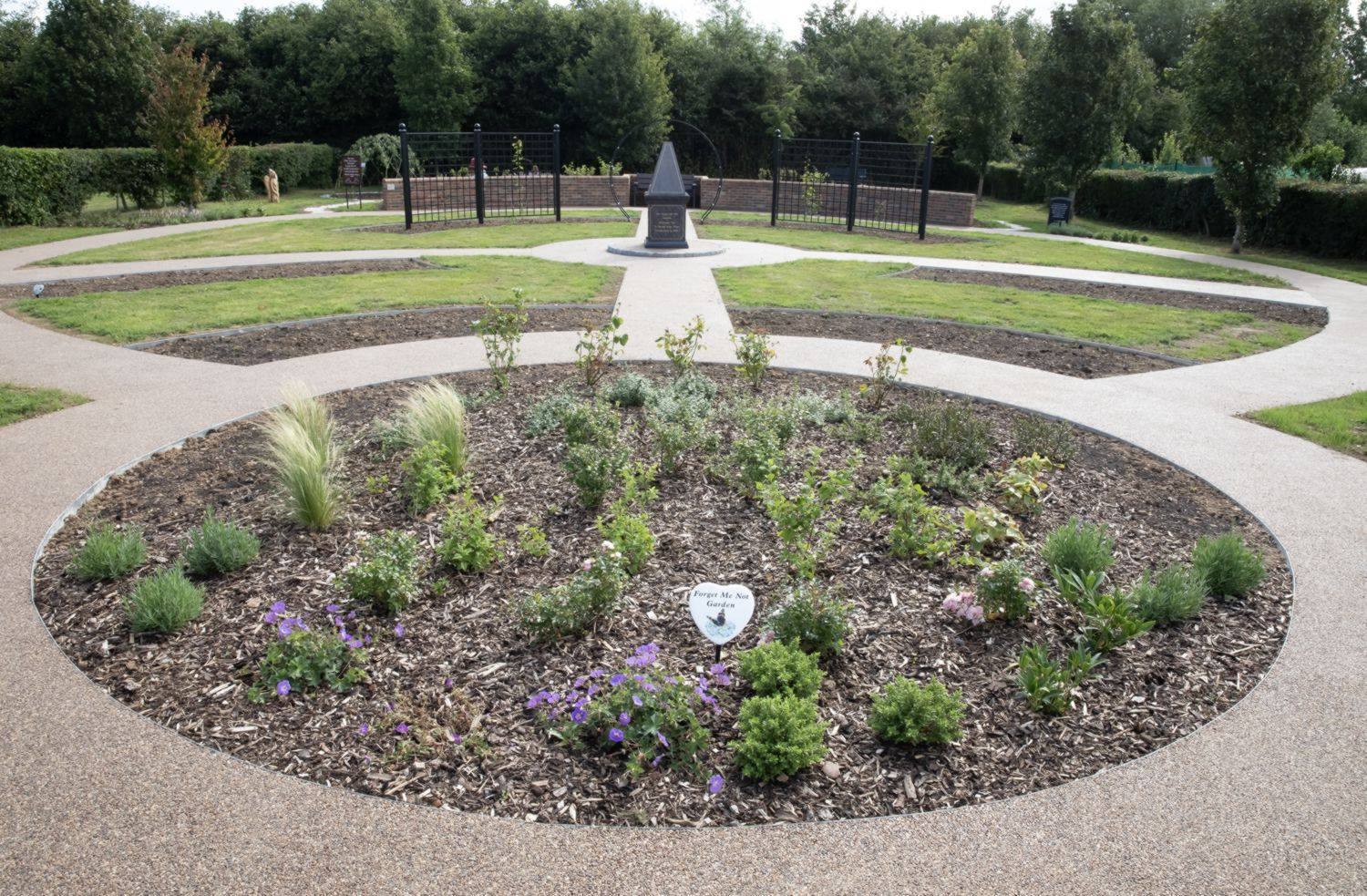 A bed of flowers in a memorial garden