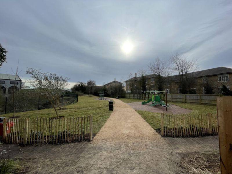 Rose hill park pathways, play equipment and seating